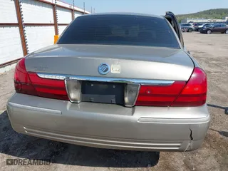 2004 Mercury Grand Marquis GS with VIN 2MEFM74W94X674014, listed as a IAAI auction lot 41973693 with 163,865 mi miles. Bid and sale history available at carsss.com. Image 15.