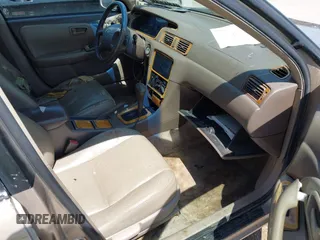 1997 Toyota Camry LE z VIN JT2BF22K6V0081619, wystawiony jako IAAI lot #42344289 z przebiegiem Nie podano mil oraz . Historia ofert i sprzedaży dostępna na DreamBid. Obrazek 5.