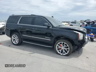 2017 GMC Yukon Denali with VIN 1GKS1CKJ9HR211240, listed as a Copart auction lot 50973015 with 95,484 mi miles and Salvage Title. Bid and sale history available at carsss.com. Image 4.