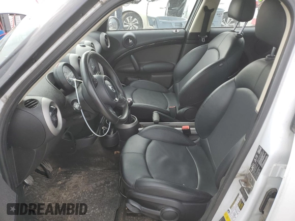 2012 MINI Countryman S with VIN WMWZC5C58CWM13141, listed as a Copart auction lot 48894185 with 128,291 mi miles and Salvage Title. Bid and sale history available at DreamBid. Image 7.