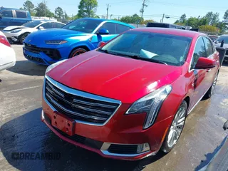 2019 Cadillac XTS Luxury z VIN 2G61M5S39K9118573, wystawiony jako IAAI lot #42014038 z przebiegiem 99 247 mil mil oraz . Historia ofert i sprzedaży dostępna na DreamBid. Obrazek 2.