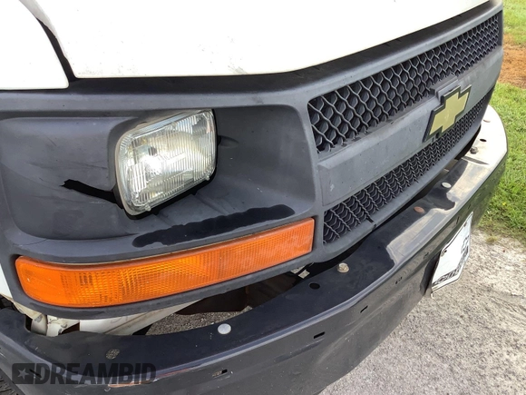 2013 Chevrolet Express Cargo z VIN 1GCSGAFX0D1173242, wystawiony jako IAAI lot #42792060 z przebiegiem 263 409 mil mil oraz . Historia ofert i sprzedaży dostępna na DreamBid. Obrazek 20.