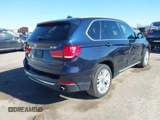 2016 BMW X5 sDrive35i with VIN 5UXKR2C55G0R71330, listed as a IAAI auction lot 41661140 with 128,457 mi miles. Bid and sale history available at carsss.com. Image 4.