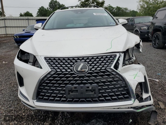 2020 Lexus RX 350 with VIN 2T2HZMDA8LC216641, listed as a Copart auction lot 56556085 with 87,646 mi miles and Salvage title. Bid and sale history available at DreamBid. Image 5.