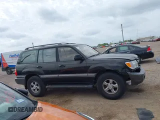 2001 Toyota Land Cruiser z VIN JTEHT05J812001099, wystawiony jako IAAI lot #42057630 z przebiegiem Nie podano mil oraz . Historia ofert i sprzedaży dostępna na DreamBid. Obrazek 12.