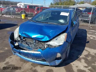 2013 Toyota Prius c One with VIN JTDKDTB33D1554073, listed as a IAAI auction lot 41666240 with 307,198 mi miles. Bid and sale history available at carsss.com. Image 2.