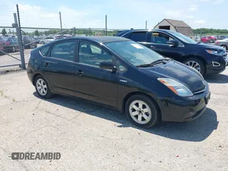 2007 Toyota Prius z VIN JTDKB20U077572754, wystawiony jako IAAI lot #42820494 z przebiegiem 101 045 mil mil oraz . Historia ofert i sprzedaży dostępna na DreamBid. Obrazek 1.