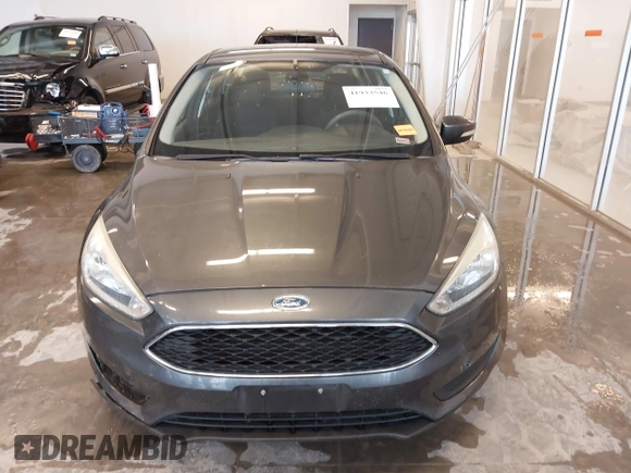2016 Ford Focus SE with VIN 1FADP3F20GL234077, listed as a IAAI auction lot 41933546 with 106,184 mi miles and . Bid and sale history available at DreamBid. Image 12.