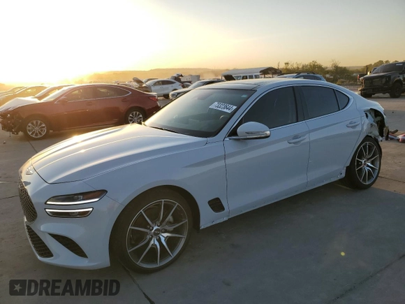 2022 Genesis G70 2.0T with VIN KMTG34TA7NU103693, listed as a Copart auction lot 73323644 with 10,901 mi miles and Salvage Title. Bid and sale history available at carsss.com. Image 1.