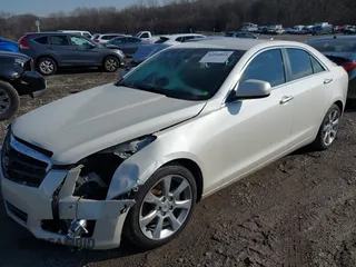 2014 Cadillac ATS Standard RWD with VIN 1G6AA5RX3E0163203, listed as a IAAI auction lot 41294865 with 183,083 mi miles. Bid and sale history available at carsss.com. Image 2.