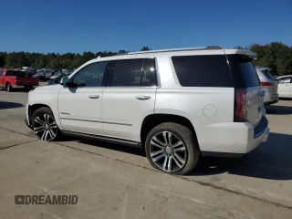 2019 GMC Yukon Denali with VIN 1GKS2CKJ1KR310963, listed as a Copart auction lot 75862254 with 102,602 mi miles and Salvage Title. Bid and sale history available at carsss.com. Image 2.