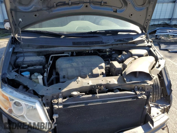 2012 Honda Odyssey EX-L with VIN 5FNRL5H62CB015738, listed as a Copart auction lot 47268455 with 150,924 mi miles and Salvage Title. Bid and sale history available at DreamBid. Image 12.