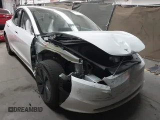 2024 Tesla Model 3 with VIN 5YJ3E1EA9RF836300, listed as a IAAI auction lot 41988009 with 9,989 mi miles. Bid and sale history available at carsss.com. Image 1.