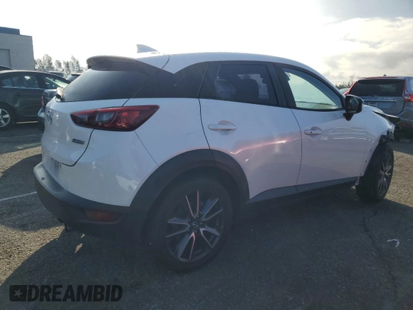 2018 Mazda CX-3 Touring with VIN JM1DKDC77J0318422, listed as a Copart auction lot 44514825 with 54,846 mi miles and Salvage Title. Bid and sale history available at carsss.com. Image 3.
