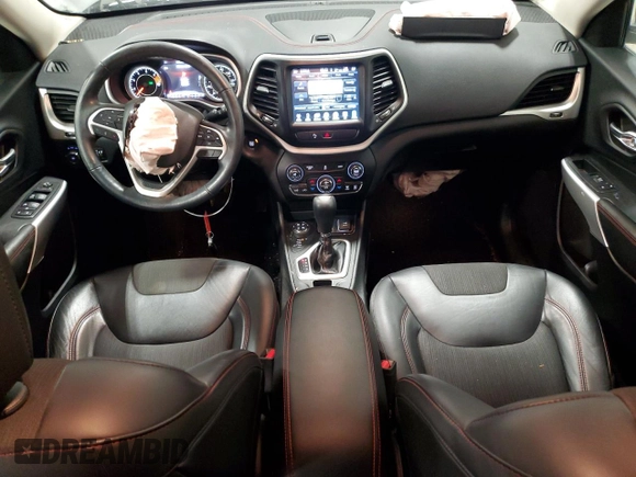 2018 Jeep Cherokee Trailhawk with VIN 1C4PJMBB8JD599791, listed as a Copart auction lot 86650054 with 66,360 mi miles and Non Repairable. Bid and sale history available at DreamBid. Image 8.