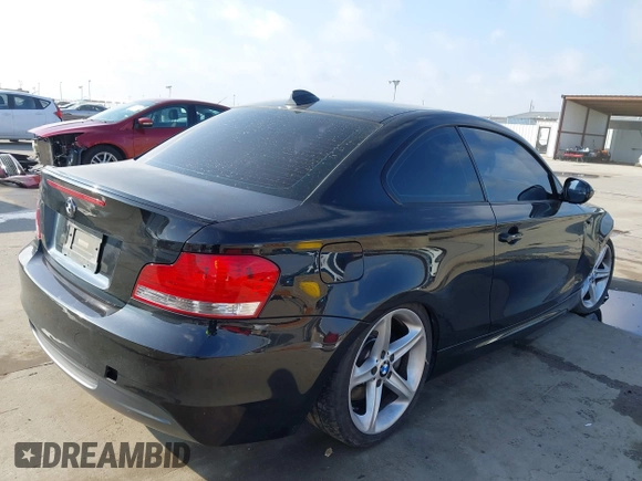 2010 BMW 1 Series 135i with VIN WBAUC7C52AVK81194, listed as a IAAI auction lot 41801510 with 123,925 mi miles and . Bid and sale history available at carsss.com. Image 4.