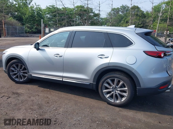 2020 Mazda CX-9 Grand Touring with VIN JM3TCBDY6L0424584, listed as a IAAI auction lot 42473920 with 32,385 mi miles and . Bid and sale history available at DreamBid. Image 14.