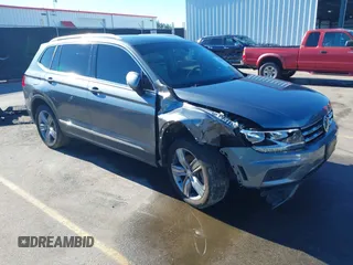 2021 Volkswagen Tiguan SE with VIN 3VV2B7AX2MM001713, listed as a IAAI auction lot 41357396 with 81,872 mi miles and . Bid and sale history available at DreamBid. Image 1.