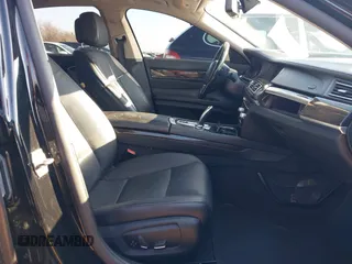 2013 BMW 7 Series 740i with VIN WBAYA6C55DC995094, listed as a IAAI auction lot 41246796 with 164,394 mi miles. Bid and sale history available at carsss.com. Image 5.