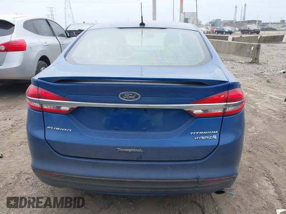 2017 Ford Fusion Hybrid Titanium с VIN 3FA6P0RU5HR388615, выставлен на аукционе IAAI как лот 42066142 с пробегом 121 618 миль миль и . История ставок и продаж доступна на DreamBid. Изображение 16.