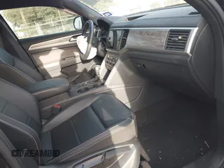 2021 Volkswagen Atlas SE with VIN 1V2WE2CA3MC240934, listed as a IAAI auction lot 41739347 with 44,485 mi miles and . Bid and sale history available at DreamBid. Image 5.