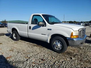2000 Ford Super Duty F-250 XL with VIN 1FTNF20F1YEE22751, listed as a Copart auction lot 75277264 with 353,884 mi miles and Salvage Title. Bid and sale history available at carsss.com. Image 4.