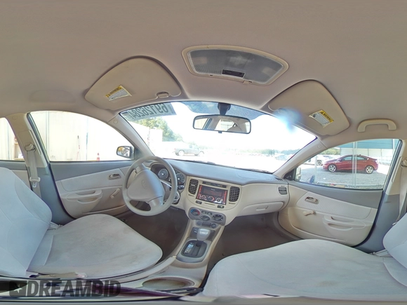 2009 Kia Rio LX with VIN KNADE223996521831, listed as a Copart auction lot 69126284 with 183,796 mi miles and Salvage Title. Bid and sale history available at DreamBid. Image 13.