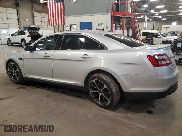 2015 Ford Taurus SEL z VIN 1FAHP2E85FG177576, wystawiony jako Copart lot #54739595 z przebiegiem 89 156 mil mil oraz Szkoda całkowita • Salvage title. Historia ofert i sprzedaży dostępna na DreamBid. Obrazek 2.