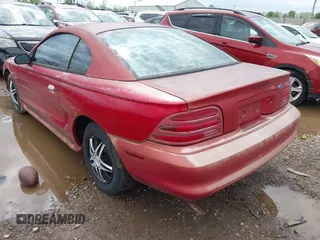 1995 Ford Mustang with VIN 1FALP4043SF275029, listed as a IAAI auction lot 42186318 with 107,651 mi miles and . Bid and sale history available at DreamBid. Image 3.