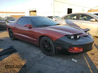 2001 Pontiac Firebird with VIN 2G2FS22K512112795, listed as a Copart auction lot 89408335 with 125,715 mi miles and Clean Title. Bid and sale history available at carsss.com. Image 4.