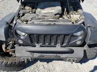 2014 Jeep Wrangler Unlimited Rubicon with VIN 1C4BJWFG8EL188494, listed as a Copart auction lot 46281415 with 171,532 mi miles and Salvage Title. Bid and sale history available at carsss.com. Image 12.