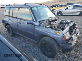 1995 Suzuki Sidekick JX z VIN 2S3TD03V5S6403069, wystawiony jako Copart lot #80273204 z przebiegiem Nie podano mil oraz Szkody całkowita. Historia ofert i sprzedaży dostępna na DreamBid. Obrazek 4.