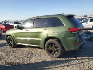 2021 Jeep Grand Cherokee Trackhawk with VIN 1C4RJFN91MC819067, listed as a Copart auction lot 42975965 with 36,986 mi miles and Clean title. Bid and sale history available at DreamBid. Image 2.