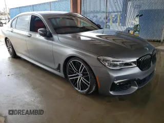 2017 BMW 7 Series 750i with VIN WBA7F0C37HGM22348, listed as a Copart auction lot 65400123 with 0 mi miles. Bid and sale history available at carsss.com. Image 4.