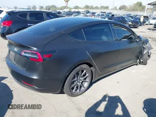 2019 Tesla Model 3 Mid Range with VIN 5YJ3E1EA0KF509547, listed as a IAAI auction lot 40720566 with 41,655 mi miles and . Bid and sale history available at DreamBid. Image 4.