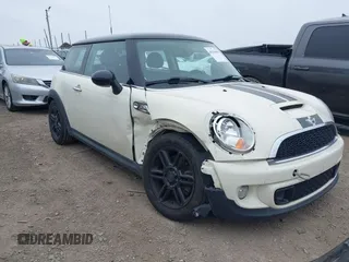 2013 MINI Hardtop S with VIN WMWSV3C53DT393190, listed as a IAAI auction lot 41636986 with 63,278 mi miles and . Bid and sale history available at DreamBid. Image 1.