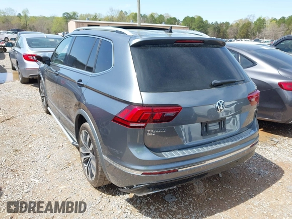 2018 Volkswagen Tiguan SEL Premium with VIN 3VV5B7AX4JM201579, listed as a IAAI auction lot 41932201 with 118,728 mi miles and . Bid and sale history available at DreamBid. Image 3.