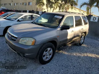 2002 Mazda Tribute LX with VIN 4F2YU091X2KM22268, listed as a Copart auction lot 82915484 with 70,684 mi miles and Clean Title. Bid and sale history available at carsss.com. Image 1.