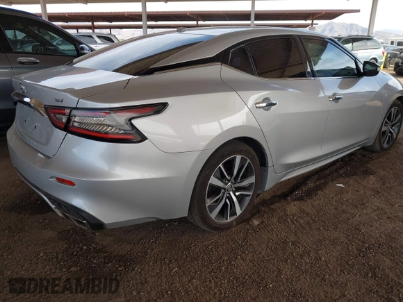 2020 Nissan Maxima SV z VIN 1N4AA6CV8LC361190, wystawiony jako IAAI lot #42225461 z przebiegiem 102 879 mil mil oraz . Historia ofert i sprzedaży dostępna na DreamBid. Obrazek 4.
