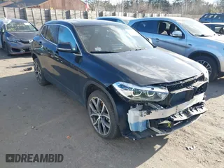 2022 BMW X2 xDrive28i with VIN WBXYJ1C00N5U75582, listed as a IAAI auction lot 41251978 with 44,851 mi miles. Bid and sale history available at carsss.com. Image 1.
