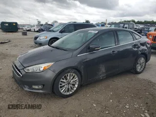 2015 Ford Focus Titanium with VIN 1FADP3J21FL254702, listed as a Copart auction lot 59872395 with 93,195 mi miles and Salvage title. Bid and sale history available at DreamBid. Image 1.