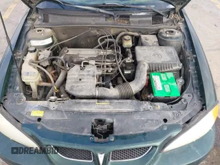2002 Pontiac Grand Am SE1 with VIN 1G2NF52FX2C165546, listed as a IAAI auction lot 41290065 with 149,834 mi miles. Bid and sale history available at carsss.com. Image 10.