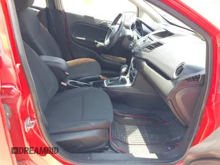 2015 Ford Fiesta SE z VIN 3FADP4EJ4FM166653, wystawiony jako IAAI lot #42410322 z przebiegiem 141 305 mil mil oraz . Historia ofert i sprzedaży dostępna na DreamBid. Obrazek 5.