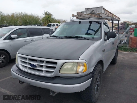 2003 Ford F-150 XL with VIN 1FTRF17273NB08996, listed as a IAAI auction lot 41799869 with Not Provided miles and . Bid and sale history available at DreamBid. Image 6.