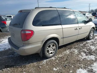 2002 Dodge Caravan EX with VIN 2B8GP74L42R790382, listed as a IAAI auction lot 41364303 with 136,569 mi miles. Bid and sale history available at carsss.com. Image 4.