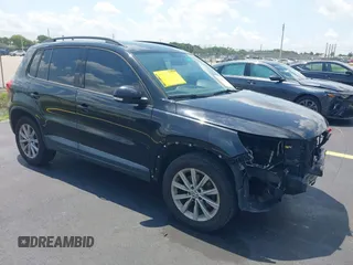 2015 Volkswagen Tiguan SE z VIN WVGAV7AX9FW555315, wystawiony jako IAAI lot #42344544 z przebiegiem 117 990 mil mil oraz . Historia ofert i sprzedaży dostępna na DreamBid. Obrazek 1.