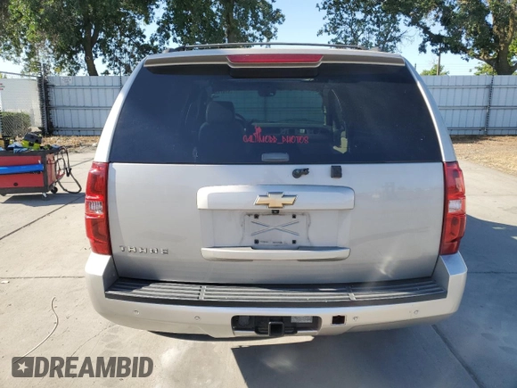 2007 Chevrolet Tahoe LT with VIN 1GNFC13J17J145992, listed as a Copart auction lot 57673385 with 151,804 mi miles and Salvage title. Bid and sale history available at DreamBid. Image 6.