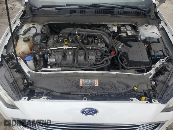 2020 Ford Fusion SE z VIN 3FA6P0T9XLR138977, wystawiony jako Copart lot #55260085 z przebiegiem 92 470 mil mil oraz Szkoda całkowita • Salvage title. Historia ofert i sprzedaży dostępna na DreamBid. Obrazek 11.