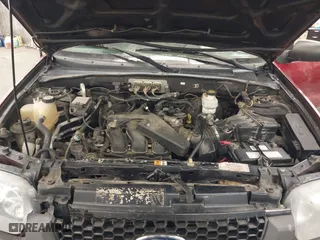 2006 Ford Escape XLT with VIN 1FMYU93176KD47219, listed as a IAAI auction lot 41785112 with 247,175 mi miles. Bid and sale history available at carsss.com. Image 10.