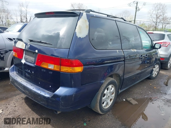 2004 Honda Odyssey EX-L with VIN 5FNRL189X4B045588, listed as a IAAI auction lot 41928397 with 218,182 mi miles and . Bid and sale history available at DreamBid. Image 4.